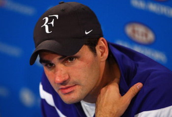 MELBOURNE, AUSTRALIA - FEBRUARY 01: Roger Federer of Switzerland talks to the media at a press conference after his men's final match against Rafael Nadal of Spain during day fourteen of the 2009 Australian Open at Melbourne Park on February 1, 2009 in