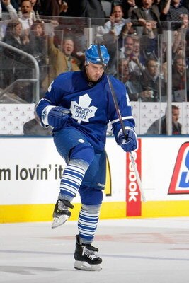 TORONTO - NOVEMBER 4:   Mike Van Ryn #26 of the Toronto Maple Leafs celebrates during the game against the Carolina Hurricanes at the Air Canada Centre on November 4, 2008 in Toronto, Ontario.(Photo By Dave Sandford/Getty Images)