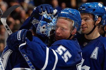 TORONTO - DECEMBER 30:  Jason Blake #55 of the Toronto Maple Leafs congratulates Curtis Joseph #31 following the game against the Atlanta Thrashers at Air Canada Centre on December 30, 2008 in Toronto, Ontario. (Photo by Dave Sandford/Getty Images)