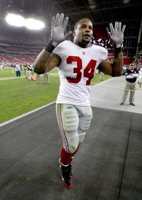 GLENDALE, AZ - NOVEMBER 23:  Running back Derrick Ward #34 of the New York Giants celebrates as he leaves the field after the game with the Arizona Cardinals on November 23, 2008 at University of Phoenix Stadium in Glendale, Arizona. The Giants won 37-29.