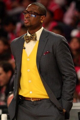 PHOENIX - FEBRUARY 13:  Assistant coach Dwyane Wade of the Rookie team wathces the action during the T-Mobile Rookie Challenge & Youth Jam part of 2009 NBA All-Star Weekend at US Airways Center on February 13, 2009 in Phoenix, Arizona.  NOTE TO USER: User