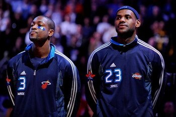 PHOENIX - FEBRUARY 15:  Dwyane Wade #3 and LeBron James #23 of the Eastern Conference stand during the National Anthem before the 58th NBA All-Star Game, part of 2009 NBA All-Star Weekend at US Airways Center on February 15, 2009 in Phoenix, Arizona.  NOT