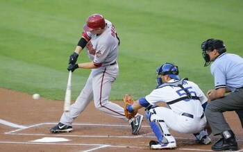 LOS ANGELES - JULY 31:   Stephen Drew #6 of the Arizona Diamondbacks hits a single in the first inning against the Los Angeles Dodgers at Dodger Stadium on July 31, 2008 in Los Angeles, California.  (Photo by Lisa Blumenfeld/Getty Images)