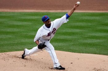 NEW YORK - SEPTEMBER 27:  Johan Santana #57 of the New York Mets pitches against the Florida Marlins on September 27, 2008 at Shea Stadium in the Flushing neighborhood of the Queens borough of New York City.  (Photo by Jim McIsaac/Getty Images)