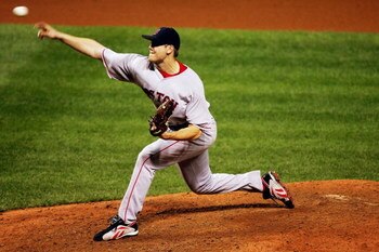 CLEVELAND - OCTOBER 18:  Closing pitcherJonathan Papelbon #58 of the Boston Red Sox delivers against the Cleveland Indians during Game Five of the American League Championship Series at Jacobs Field on October 18, 2007 in Cleveland, Ohio.  The Red Sox won