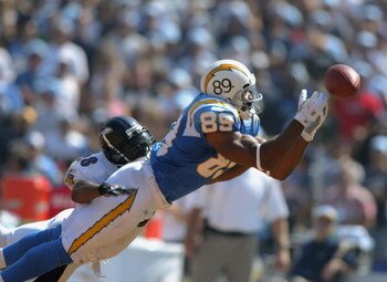 SAN DIEGO - SEPTEMBER 21:  The ball slips through the hands of wide receiver David Boston #89 of the San Diego Chargers as Gary Baxter #28 of the Baltimore Ravens defends on September 21, 2003 at Qualcomm Stadium in San Diego, California. The Ravens defea
