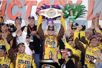 LAS VEGAS - MARCH 01:  Kyle Busch, driver of the #18 M&M's Toyota, celebrates in Victory Lane after winning the NASCAR Sprint Cup Series Shelby 427 at the Las Vegas Motor Speedway on March 1, 2009 in Las Vegas, Nevada.  (Photo by Rusty Jarrett/Getty Image