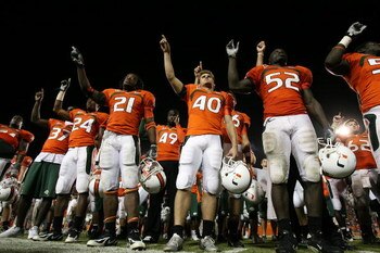 CORAL GABLES, FL - NOVEMBER 10:  The Miami Hurricanes sing their alma mater with fans after losing to the Virginia Cavaliers at the Orange Bowl November 10, 2007 in Coral Gables, Florida. The Hurricanes played their last game in the Orange Bowl as Virgini