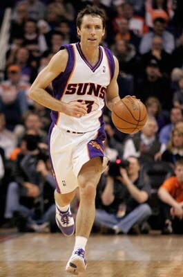 PHOENIX - FEBRUARY 06:  Steve Nash #13 of the Phoenix Suns brings the ball upcourt during the game against the New Orleans Hornets on February 6, 2008 at US Airways Center in Phoenix, Arizona.  The Hornets won in double overtime 132-130.   NOTE TO USER: U