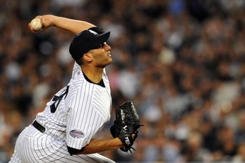 NEW YORK - SEPTEMBER 21:  Starting pitcher Andy Pettitte #46 of the New York Yankees deals against the Baltimore Orioles during the last regular season game at Yankee Stadium on September 21, 2008 in the Bronx borough of New York City. The Yankees are pla