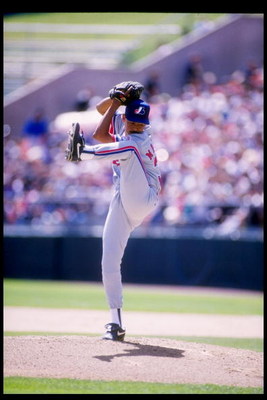 10 Apr 1993:  Pitcher Dennis Martinez of the Montreal Expos winds up for the pitch during a game against the Colorado Rockies at Coors Field in Denver, Colorado. Mandatory Credit: Tim de Frisco  /Allsport
