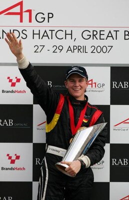 LONGFIELD, UNITED KINGDOM - APRIL 29:  Nico Hulkenberg of Germany celebrates his victory ahead of Robbie Kerr of Great Britain on the podium following the British A1 Grand Prix Feature Race at Brands Hatch on April 29, 2007 in Longfield, England.  (Photo 