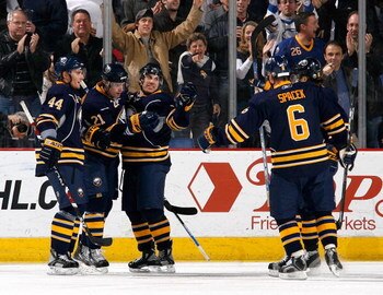 BUFFALO, NY - NOVEMBER 28: Andrej Sekera #44, Drew Stafford #21, Derek Roy #9, Jaroslav Spacek #6 and Maxim Afinogenov #61 of the Buffalo Sabres celebrate Stafford's goal in the first period against the Pittsburgh Penguins  on November 28, 2008 at HSBC Ar