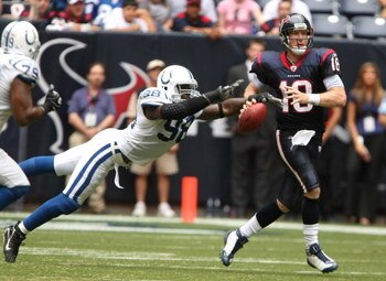 HOUSTON - OCTOBER 05:  Defensive end Robert Mathis #98 of the Indianapolis Colts strips the ball from quarterback Sage Rosenfels #18 of the Houston Texans late in the fourth quarter on October 5, 2008 at Reliant Stadium in Houston, Texas.  The play set up