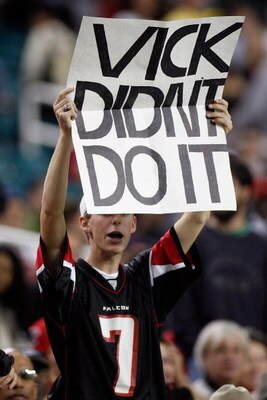 ATLANTA - DECEMBER 10:  A man holds up a sign in support of Michael Vick formerly of the Atlanta Falcons during the game against the New Orleans Saints on December 10, 2007 at the Georgia Dome in Atlanta, Georgia.  The Saints defeated the Falcons 34-14.  