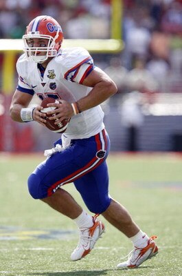 OXFORD, MS - SEPTEMBER 22: Tim Tebow #15 of the Florida Gators runs against the Mississippi Rebels on September 22, 2007 at Vaught-Hemingway Stadium/Hollingsworth Field in Oxford, Mississippi. Florida won  30-24. (Photo by Joe Murphy/Getty Images)