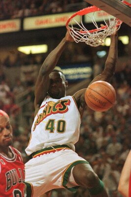 14 Jun 1996: Shawn Kemp #40 of the Seattle Supersonics dunks the ball over Dennis Rodman of the Chicago Bulls during the first quarter of game five of the NBA Finals at Key Arena in Seattle, Washington.
