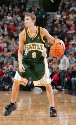 PORTLAND - NOVEMBER 30:  Luke Ridnour #8 on the Seattle Sonics moves the bal against the Portland Trail Blazers during a game on November 30, 2004 at the Rose Garden Arena in Portland, Oregon. The Blazers won 100-94. NOTE TO USER: User expressly acknowled