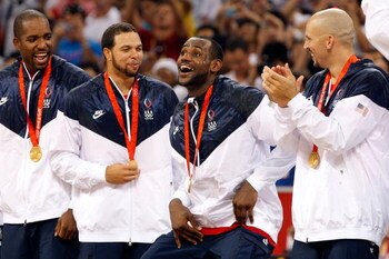 BEIJING - AUGUST 24:  (L-R) Michael Redd #8, Deron Williams #7, LeBron James #6 and Jason Kidd #5 of the United States share a laugh during the medal ceremony after defeating Spain 118-107 in the gold medal game during Day 16 of the Beijing 2008 Olympic G