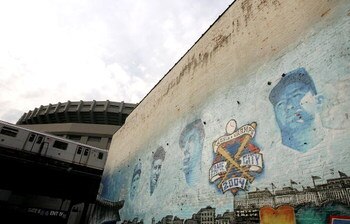 NEW YORK - OCTOBER 03:  A mural of former New York Yankees (L-R) Babe Ruth, Lou Gehrig, Joe DiMaggio and Mickey Mantle, is shown outside of Yankee Stadium prior to game one of the American League Division Series against the Detroit Tigers on October 3, 20