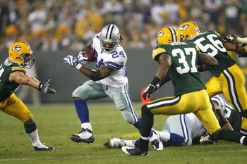 GREEN BAY - SEPTEMBER 21:  Marion Barber #24 of the Dallas Cowboys runs with the ball against the Green Bay Packers  at Lambeau Field on September 21, 2008 in Green Bay, Wisconsin. The Cowboys defeated the Packers in 27- 16.  (Photo by Tom Hauck/Getty Ima