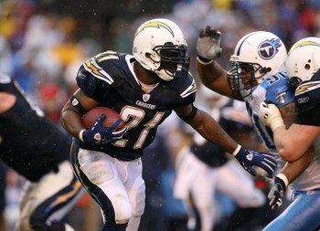 SAN DIEGO - JANUARY 06:  LaDanian Tomlinson #21 of the San Diego Chargers runs for yardage against  the Tennessee Titans in the second half during their AFC Wild Card Playoff Game at Qualcomm Stadium on January 6, 2008 in San Diego, California. The Charge
