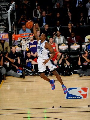 PHOENIX - FEBRUARY 14:  Dwight Howard of the Orlando Magic participates in the Sprite Slam Dunk Contest on All-Star Saturday Night, part of 2009 NBA All-Star Weekend at US Airways Center on February 14, 2009 in Phoenix, Arizona.  NOTE TO USER: User expres