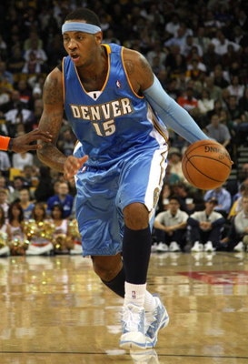 OAKLAND, CA - NOVEMBER 05:  Carmelo Anthony #15 of the Denver Nuggets drives against the Golden State Warriors during an NBA game on November 5, 2008 at Oracle Arena in Oakland, California. NOTE TO USER: User expressly acknowledges and agrees that, by dow