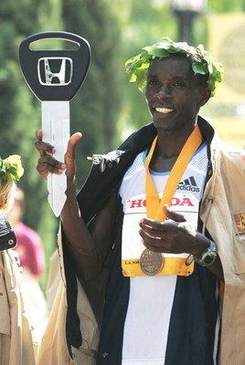 LOS ANGELES, CA - MARCH 6:  Mark Saina of Kenya holds up the ceremonial Honda key that was presented to him after finishing first in the men's division of the 20th anniversary of the Los Angeles Marathon on March 6, 2005 in Los Angeles, California. Saina 