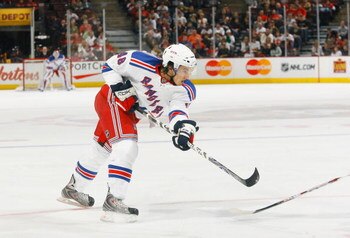OTTAWA - SEPTEMBER 20:  Michael Del Zotto #48 of the New York Rangers follows through on his shot during a game against the Ottawa Senators on September 20, 2008 at the Scotiabank Place in Ottawa, Canada.  The Ottawa Senators defeated the New York Rangers