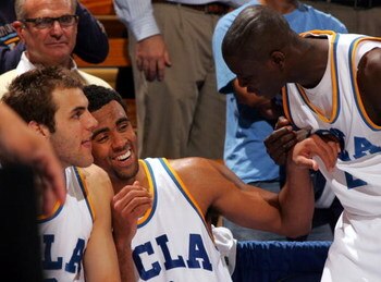 WESTWOOD, CA - FEBRUARY 19:  Josh Shipp #3 of the UCLA Bruins celebrates with teammate Darren Collison #2 after they left the game in the second half during their NCAA basketball game at Pauley Pavilion February 19, 2009 in Westwood, California. The Bruin