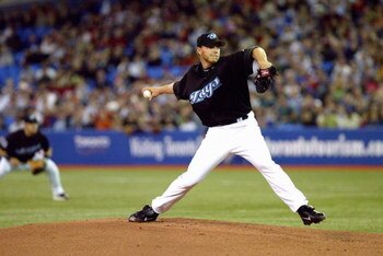 TORONTO - APRIL 9:  Roy Halladay #32 of the Toronto Blue Jays pitches against the Boston Red Sox during the game at Rogers Centre on April 9, 2005 in Toronto, Ontario, Canada.  The Blue Jays defeated the Red Sox 12-5.  (Photo by Dave Sandford/Getty Images