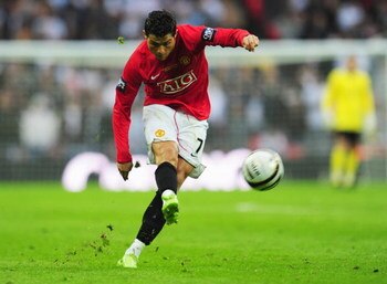 LONDON - MARCH 01:  Cristiano Ronaldo of Manchester United shoots during the Carling Cup Final match between Manchester United and Tottenham Hotspur at Wembley Stadium on March 1, 2009 in London, England.  (Photo by Mike Hewitt/Getty Images)