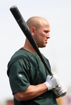 TEMPE, AZ - MARCH 08:  Matt Holliday #5 of the Oakland Athletics warms up before the spring training game against the Cleveland Indians at Phoenix Municipal Stadium on March 8, 2009 in Tempe, Arizona. The A's defeated the Indians 8-5.  (Photo by Christian