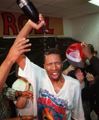 23 Jun 1994: HOUSTON ROCKET KENNY SMITH POURS CHAMPAGNE OVER HIMSELF FOLLWING THE ROCKET''S 90-84 VICOTRY OVER THE KNICKS FOR THE NBA CHAMPIONSHIP AT THE SUMMIT IN HOUSTON.
