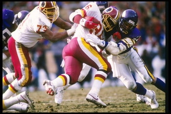 18 Jan 1988:  Running back Timmy Smith of the Washington Redskins gets tackled during a playoff game against the Minnesota Vikings at RFK Stadium in Washington, D. C.  The Redskins won the game, 17-10. Mandatory Credit: Mike Powell  /Allsport
