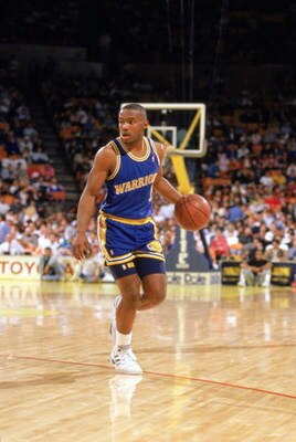 1989:  Tim Hardaway #5 of the Golden State Warriors advances the ball during an NBA game in the 1989-90 season. NOTE TO USER: User expressly acknowledges and agrees that, by downloading and/or using this Photograph, User is consenting to the terms and con