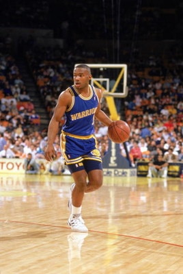 1989:  Tim Hardaway #5 of the Golden State Warriors advances the ball during an NBA game in the 1989-90 season. NOTE TO USER: User expressly acknowledges and agrees that, by downloading and/or using this Photograph, User is consenting to the terms and con