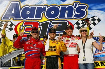 TALLADEGA, AL - APRIL 28:  Bobby Labonte, driver of the #77 Dollar General Chevrolet, poses for a photo with his team owner Delana Harvick (R), Kevin Harvick, driver of the #21 AutoZone Chevrolet and Tony Stewart, driver of the #33 Old Spice Chevrolet in 