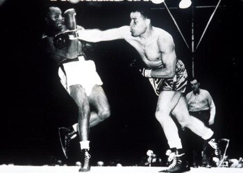 27 Jun 1948 :  Joe Louis beats Jersey Joe Walcott in  the 11th round by KO at Yankee Stadium. Credit :  Allsport. Mandatory Credit: Allsport UK/ALLSPORT
