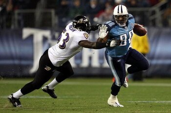 NASHVILLE, TN - JANUARY 10:  Tight end Bo Scaife #80 of the Tennessee Titans looks to avoid a tackle by Jameel McClain #53 of the Baltimore Ravens in the second quarter during the AFC Divisional Playoff Game on January 10, 2009 at LP Field in Nashville, T