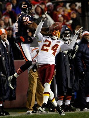 LANDOVER, MD - DECEMBER 06:  Wide receiver Bernard Berrian #80 of the Chicago Bears catches a pass over cornerback Shawn Springs #24 of the Washington Redskins in third quarter action at FedEx Field December 6, 2007 in Landover, Maryland. The Redskins won