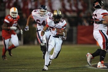 MOBILE, AL - JANUARY 24:  Running back Kory Sheets #23 of the North team runs the ball against the South team during the Under Armour Senior Bowl on January 24, 2009 at Ladd-Peebles Stadium in Mobile, Alabama.  (Photo by Ronald Martinez/Getty Images for U