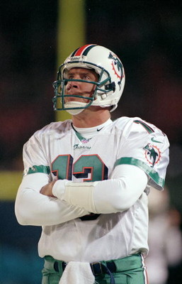 12 Dec 1999: Dan Marino #13 of the Miami Dolphins looks on during the game against the New York Jets at the Meadowlands in East Rutherford, New Jersey. The Jets defeated the Dolphins 28-20. Mandatory Credit: Al Bello /Allsport