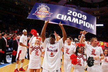NEW YORK - MARCH 14:  Andre McGee #33 of the Louisville Cardinals celebrates after defeating the Syracuse Orange during to win championship game of the Big East Tournament at Madison Square Garden on March 14, 2009 in New York City.  (Photo by Jim McIsaac