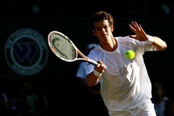 LONDON - JULY 02:  Andy Murray of Great Britain hits a forehand during the Men's Quarter Final match against Rafael Nadal of Spain on day nine of the Wimbledon Lawn Tennis Championships at the All England Lawn Tennis and Croquet Club on July 2, 2008 in Lo