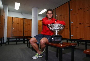 MELBOURNE, AUSTRALIA - FEBRUARY 01:  Rafael Nadal of Spain poses with the Norman Brookes Challenge Cup in the players locker room after winning the men's final match against Roger Federer of Switzerland during day fourteen of the 2009 Australian Open at M