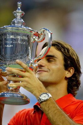 NEW YORK - SEPTEMBER 08:  Roger Federer of Switzerland kisses the trophy after defeating Andy Murray of the United Kingdom to win the 2008 U.S. Open Men's Championship Match in Arthur Ashe Stadium at the USTA Billie Jean King National Tennis Center on Sep