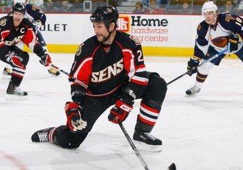 OTTAWA - DECEMBER 3:  Jason Smith #21 of the Ottawa Senators goes down to block a shot against the Atlanta Thrashers during the NHL game on December 3, 2008 at the Scotiabank Place in Ottawa, Canada.  The Senators defeated the Thrashers 5-1. (Photo by Phi