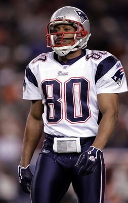 DENVER - JANUARY 14:  Troy Brown #80 of the New England Patriots walks on the field against the Denver Broncos during the AFC Divisional Playoff game on January 14, 2006 at Invesco Field at Mile High in Denver, Colorado.  (Photo by Brian Bahr/Getty Images